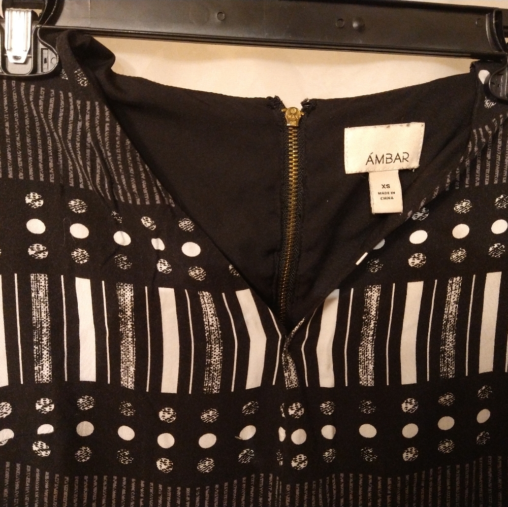 Adorable black and white romper. Size XS